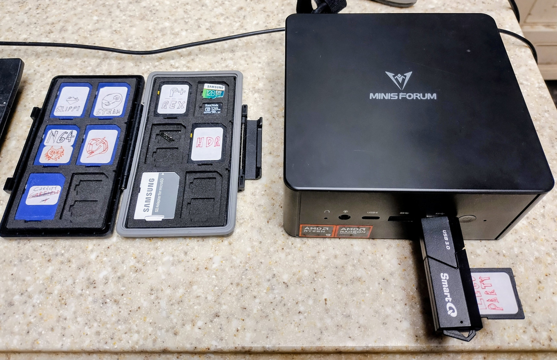 Minisforum UM890 Mini PC with cartridges