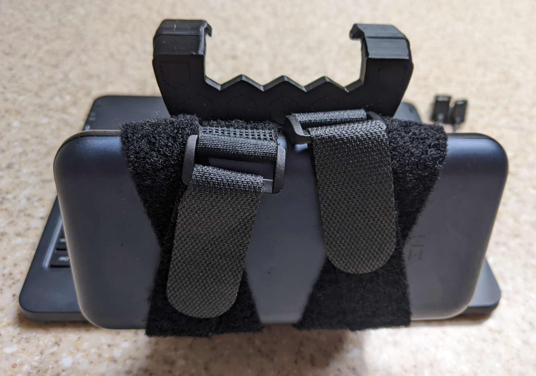 DeckTop holding a power bank